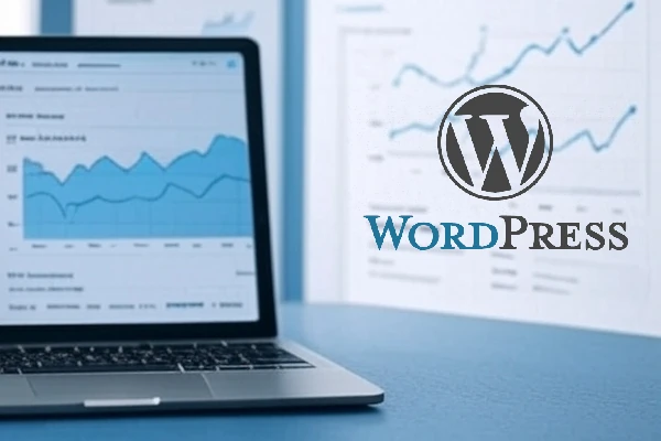 Laptop with line graph next to Wordpress logo